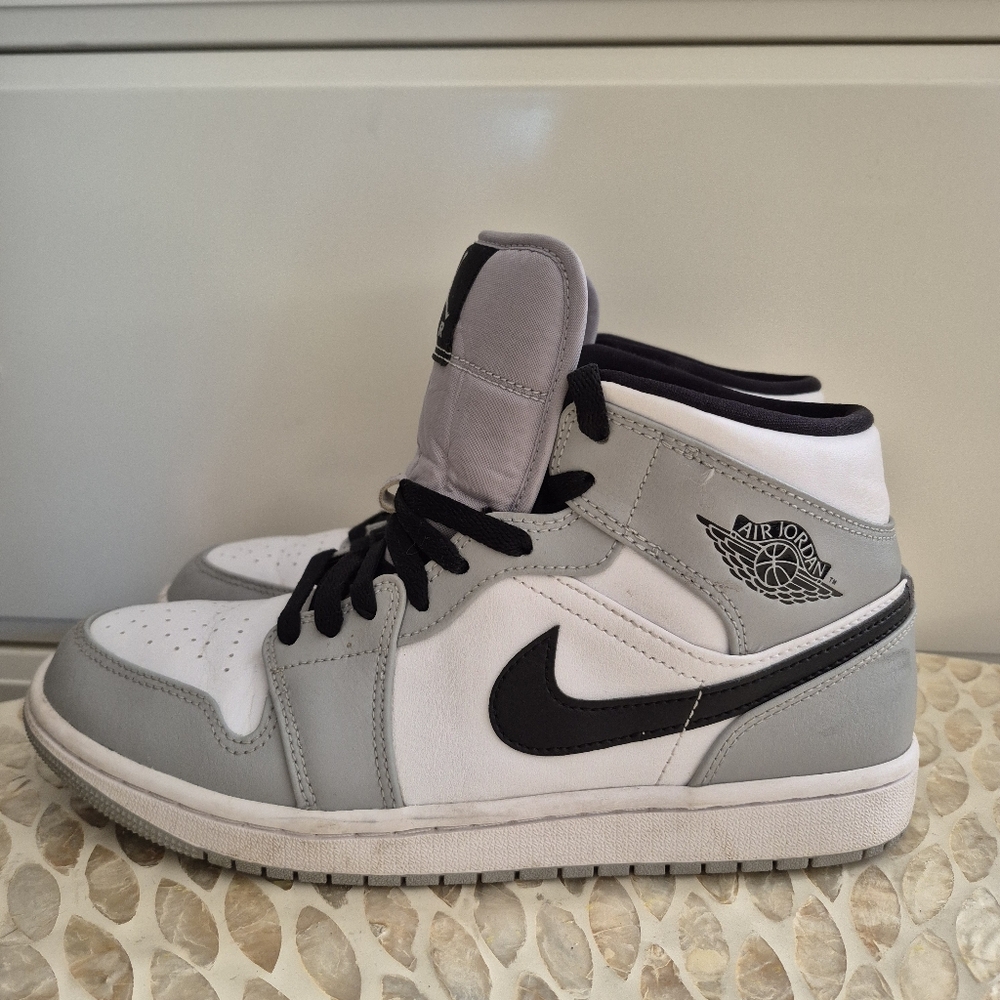 This is a Nike Air Jordan 1 Mid "Light Smoke Grey" 8.5
